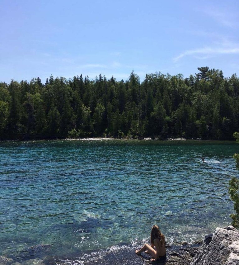 M.L. Ardalan by a lake